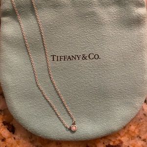 Sterling Silver with small diamond .03 on a 16” chain